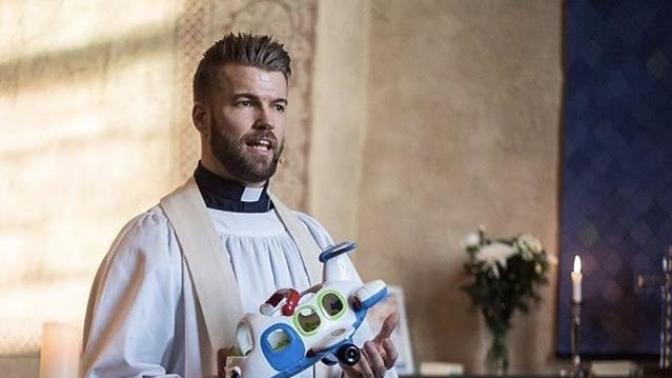 Handsome priest?