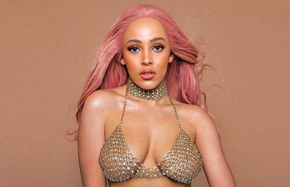 Doja Cat - Singer, songwriter and rapper. Her mom is white and her dad is black.