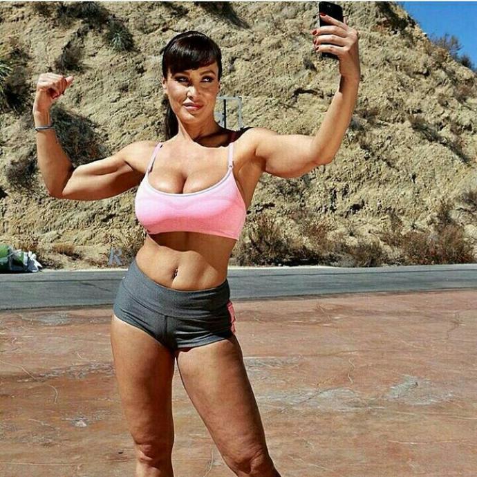 Why do girls see muscular guys as more attractive?
