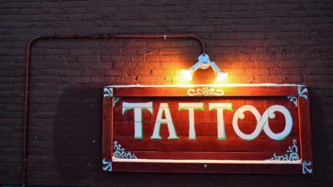 How many tattoos and/or body piercings are enough?