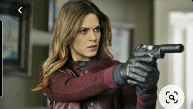 Is it just me who thinks that the hottest thing in movies is gloved women and guns?