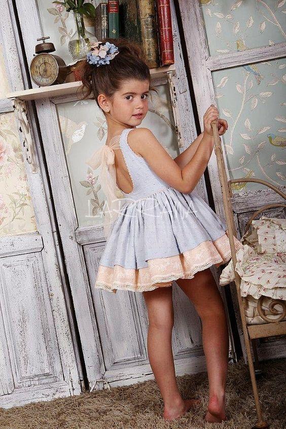 How old were you when you wore your first backless dress and did it have a bow in the back?