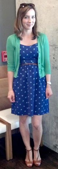 Does these heels suit the blue dress with green top that this woman is wearing?