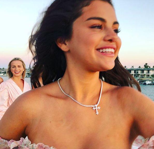 Have you ever worn a cross necklace like this woman?