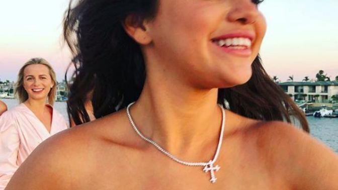 Have you ever worn a cross necklace like this woman?