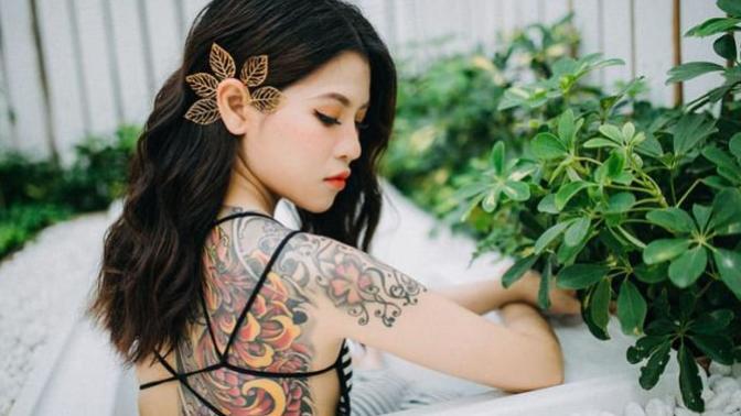 Do you think differently of a woman with tattoos?