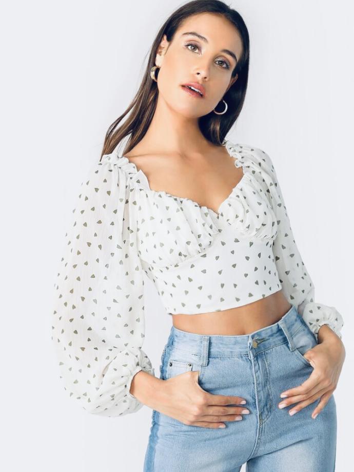 Which shirt do you like better with mid rise flare jeans ( not the ones she’s wearing) and black boots?