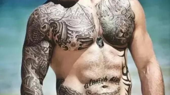 Girls, do you like guys with muscles and tattoos?