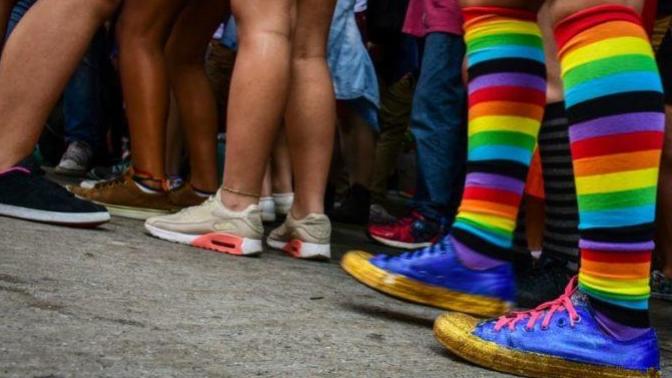 How can I reassure my little brother that there is nothing wrong with being gay?