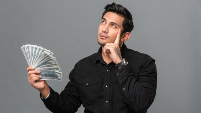 What motivates us to work HARDER: Money or happiness?