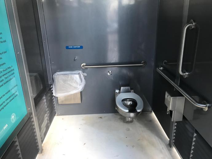 Should you use toilet seat covers while pooping in public restrooms?