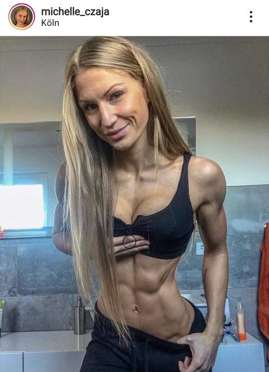 Why do almost all female bodybuilders and fitness influencers get breast  implants? - GirlsAskGuys