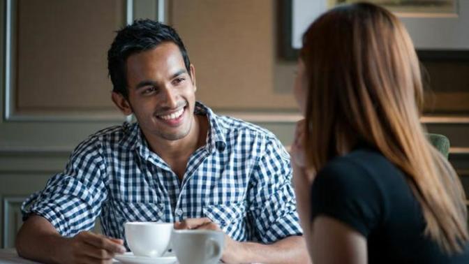 What does it mean if a guy smiles/ laughs (not in creepy a way) at everything a girl says?