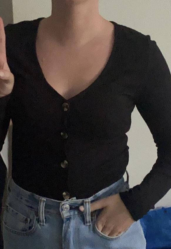 I have no cleavage - is it stupid of me to wear shirts who are cut quite open even tho I have nothing to show?
