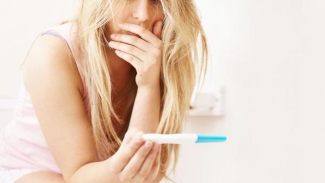 My boyfriend is pressuring me to have an abortion? He said I have to choose the pregnancy or him? Please help?