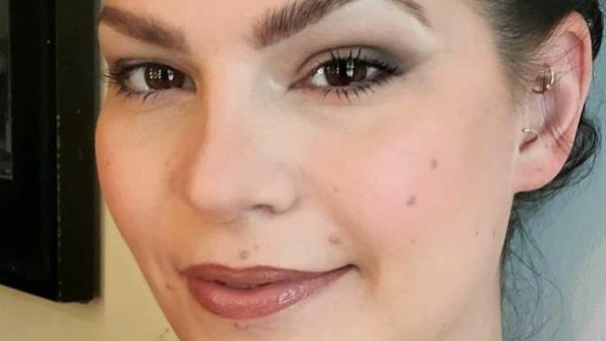 Guys, Is this woman pretty and how old does she look?