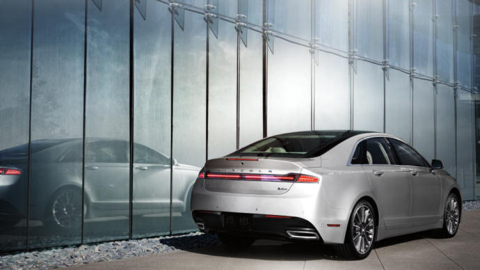 Lincoln MKZ. Id take a Continental too. Very classy cars.