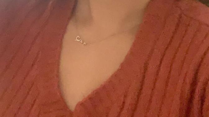 Which lipstick color should I wear today to see my boyfriend (I’m going to be wearing an orange sweater with a black skirt)?