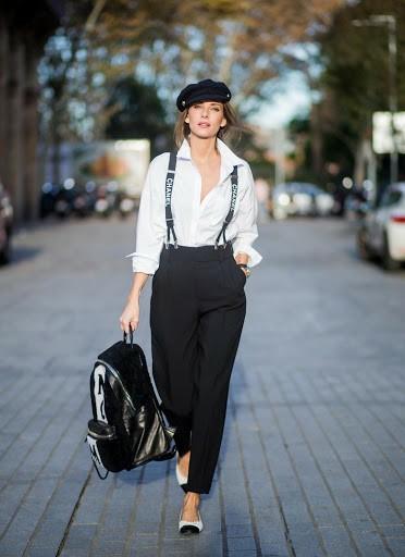 Which picture of a girl in suspenders is the most interesting?