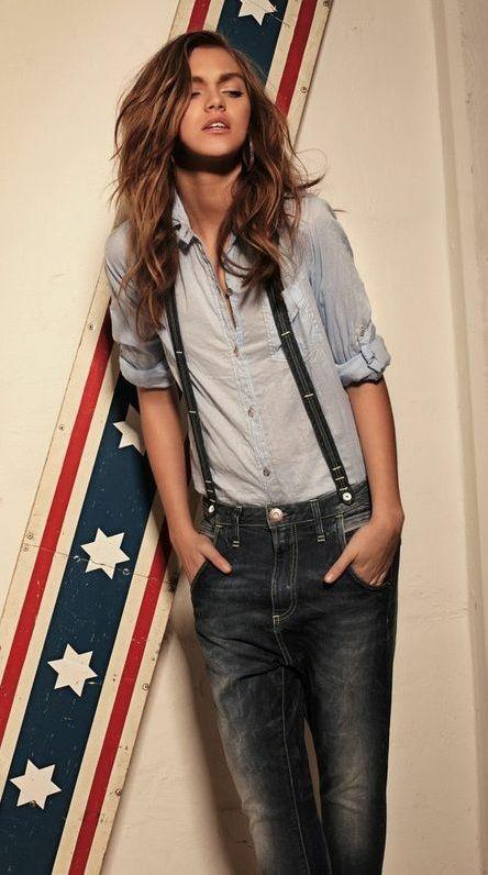 Which picture of a girl in suspenders is the most interesting?