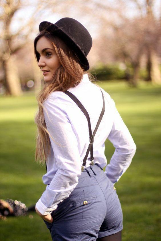 Which picture of a girl in suspenders is the most interesting?
