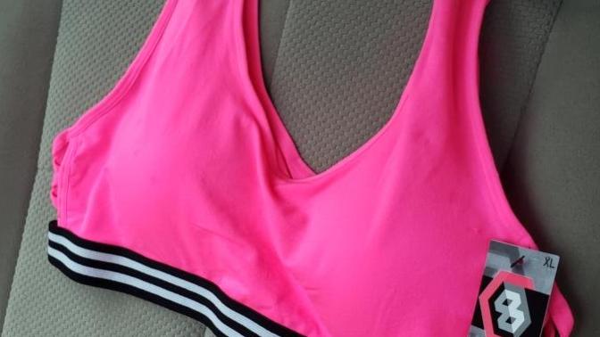 Girls, Is it noticable that I might be wearing a sports bra?