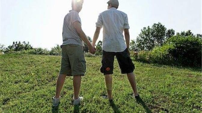 What would you do if your son asked another boy to hold his hand at school?
