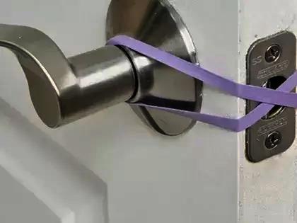 Have you ever put rubber bands on your door knobs and do you think it serves a purpose?