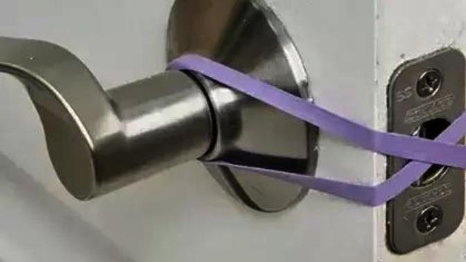 Have you ever put rubber bands on your door knobs and do you think it serves a purpose?