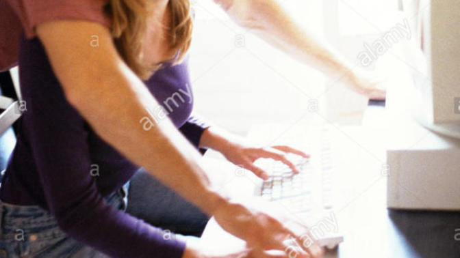 What does it mean when a guy stands over you leans forward with his hands on the table (pic example inside) ?