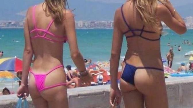 What the hell, is this another new fad or can't these bimbos figure out how to put on a bathing suit?