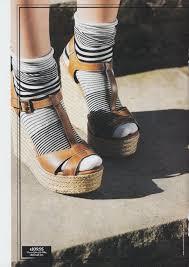 Should wedges and heels be worn with or without socks?