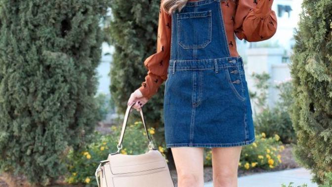 Which season is best for women to wear denim skirtalls with long sleeves shirts and heel style boots?