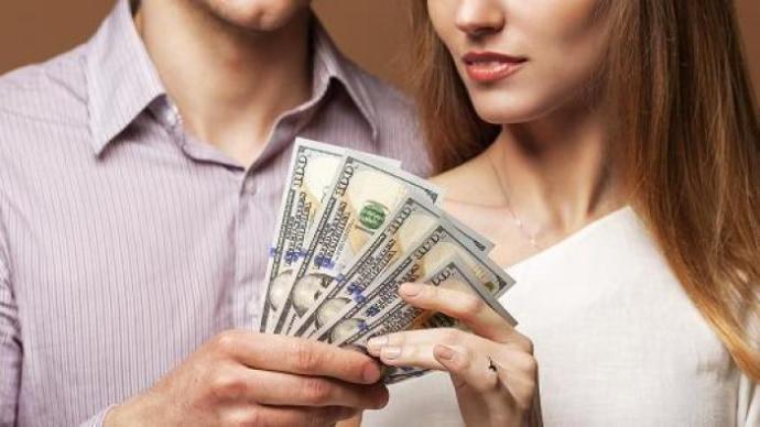 How do women feel when their boyfriend/husband gives her his money?