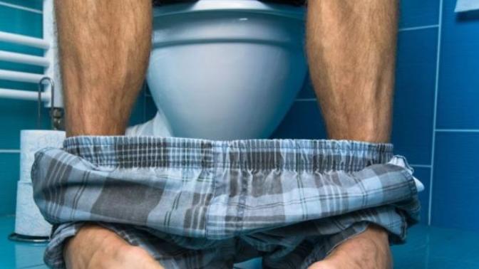 Is it okay for a guy to pee sitting down?