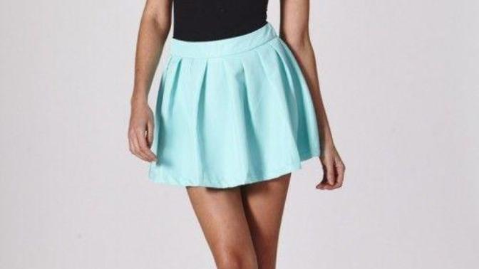 Does this skirt color match up well with this woman's shirt and shoes?