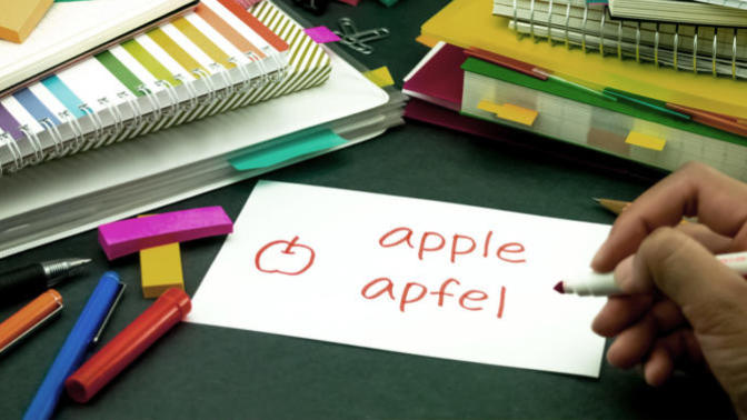 What are the best ways to learn how to write in a different language?