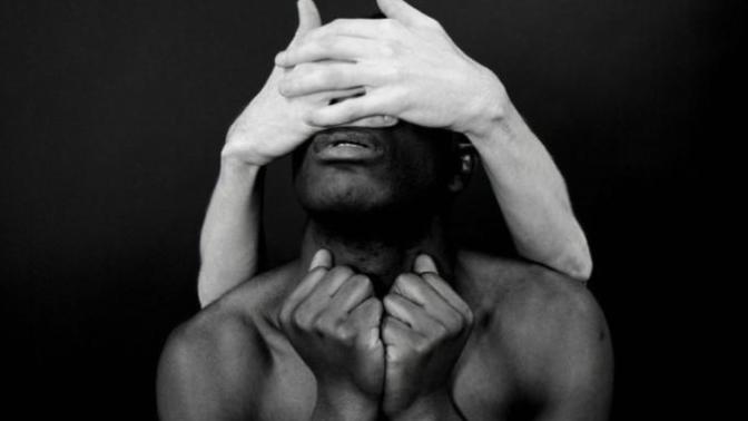 Do you think the hands that are covering up this man's eyes are of a man or of a woman?