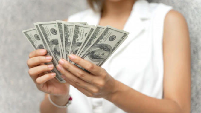 What do girls typically spend money on?