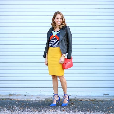 Which of these women wearing yellow skirts has the best outfit?
