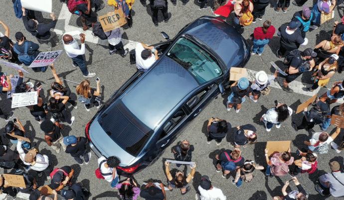 If a bunch of people surround your car, should you be allowed to do the following?