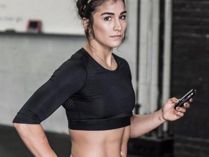 If both of these women were equally as qualified, which woman would you want to be your personal fitness trainer?