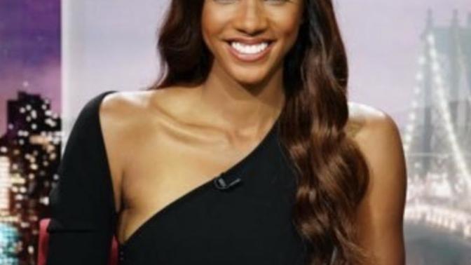 Is black a good color that Maria Taylor is wearing?