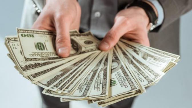 My fiance lives beyond his means? Am I overreacting?