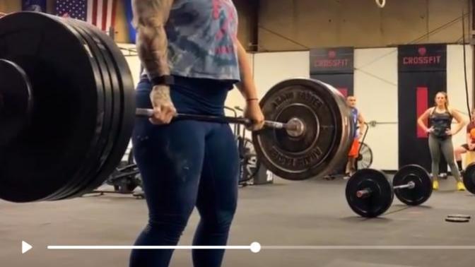 Why does this woman attract so much attention and stares from men at the gym my boyfriend and I go to? What makes her stand out?