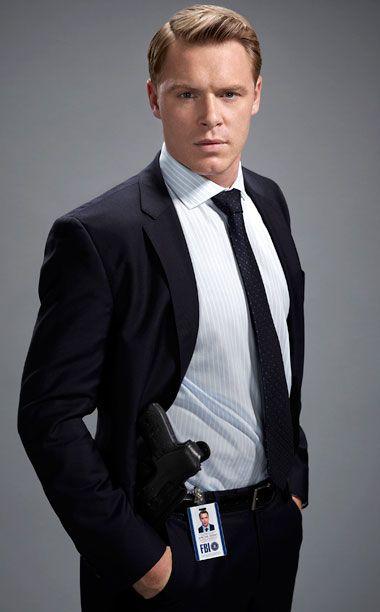Are blonde men more attractive than dark haired men? if so why? ?