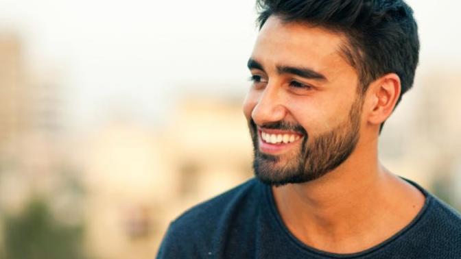 Why do men seem to move on to bigger things in life after a breakup?