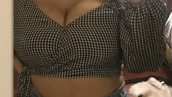How to hide bigger breasts on a short girl?