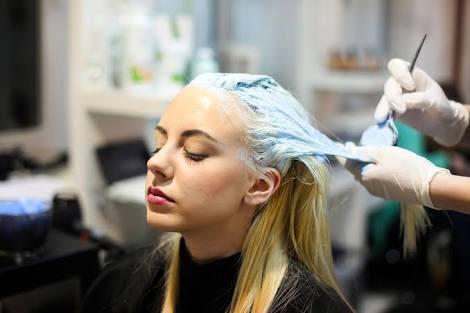 Why do women believe that blonde hair is better?
