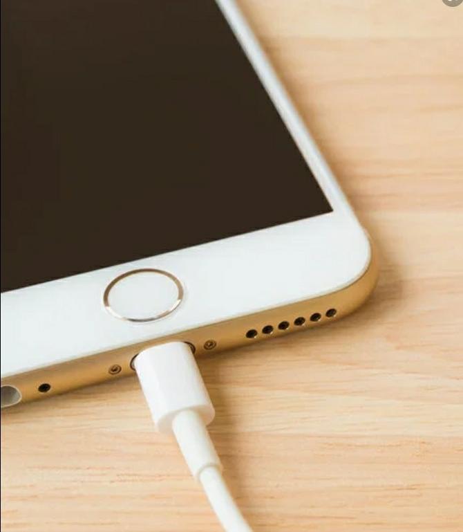 How long should I let my iPhone battery drop to before charging it in order to prolong battery capacity?